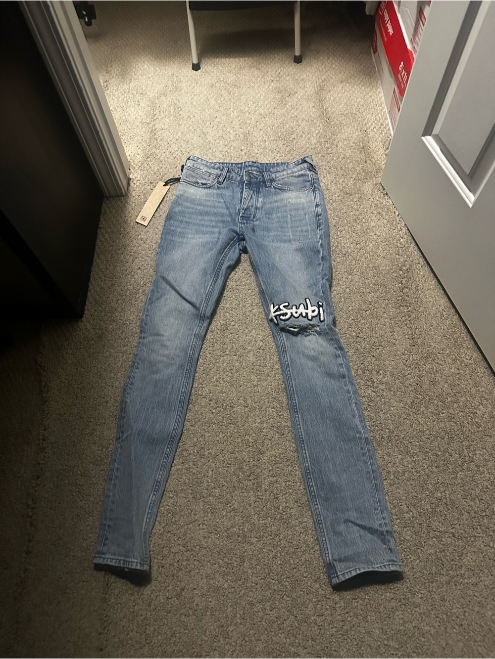 Ksubi Faded Blue Skinny Jeans with Knee Logo Patch